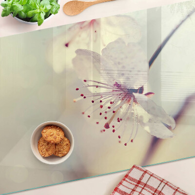 Planche à découper en verre Fleurs sur fond géométrique