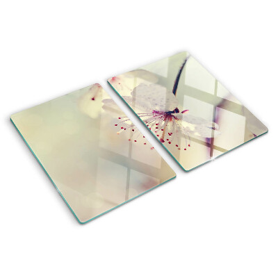 Planche à découper en verre Fleurs sur fond géométrique