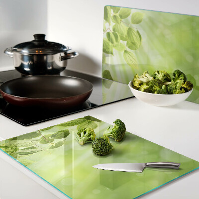 Planche à découper en verre Feuilles vertes contre la lumière