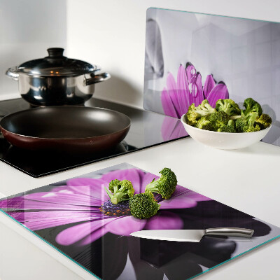 Planche à découper verre Fleur violette avec des gouttes d'eau