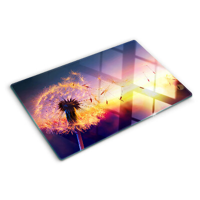 Planche à découper verre Pissenlits sur fond de coucher de soleil