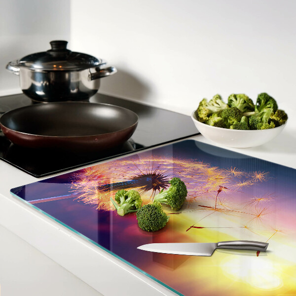 Planche à découper verre Pissenlits sur fond de coucher de soleil