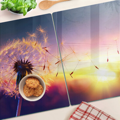 Planche à découper verre Pissenlits sur fond de coucher de soleil
