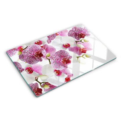 Planche à découper en verre Orchidées en arrière-plan de la fenêtre