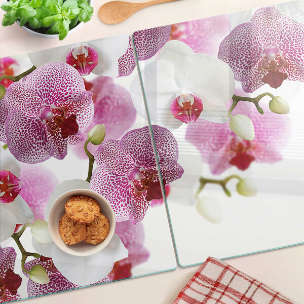 Planche à découper en verre Orchidées en arrière-plan de la fenêtre