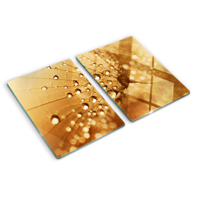 Planche à découper verre Gouttes d'eau sur un pissenlit