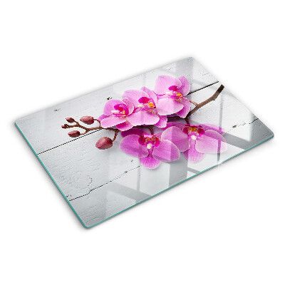 Planche à découper verre Orchidées sur fond blanc