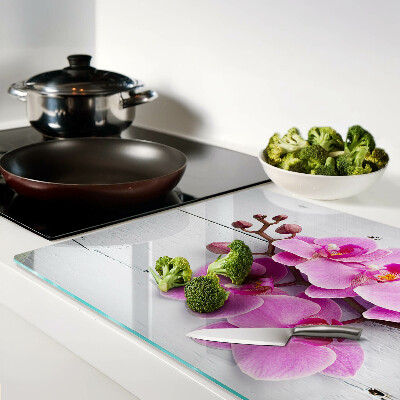 Planche à découper verre Orchidées sur fond blanc