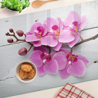 Planche à découper verre Orchidées sur fond blanc
