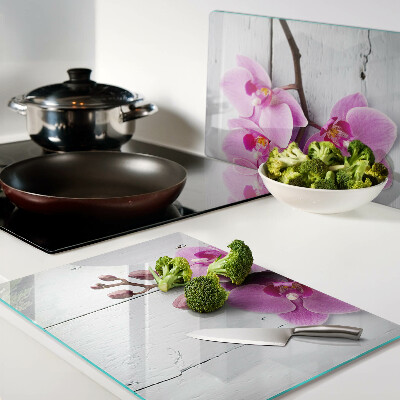Planche à découper verre Orchidées sur fond blanc