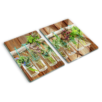 Planche à découper en verre Herbes en pots sur fond de bois