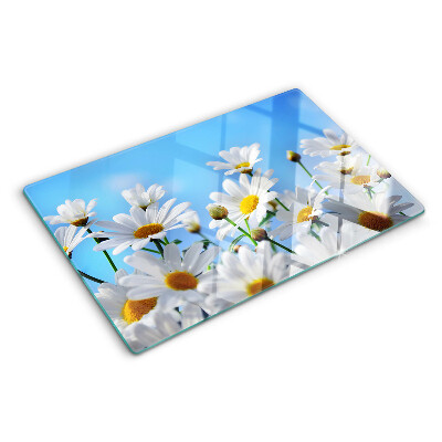 Planche à découper en verre Fleurs de marguerite sur fond bleu