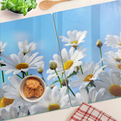 Planche à découper en verre Fleurs de marguerite sur fond bleu