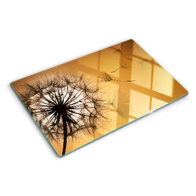 Planche à découper en verre Pissenlits sur fond de coucher de soleil