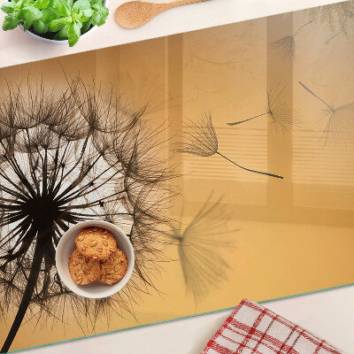 Planche à découper en verre Pissenlits sur fond de coucher de soleil