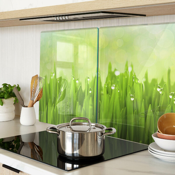 Planche à découper verre Herbe verte avec des gouttes d'eau