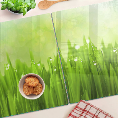 Planche à découper verre Herbe verte avec des gouttes d'eau