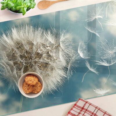 Planche à découper verre Pissenlits contre le ciel