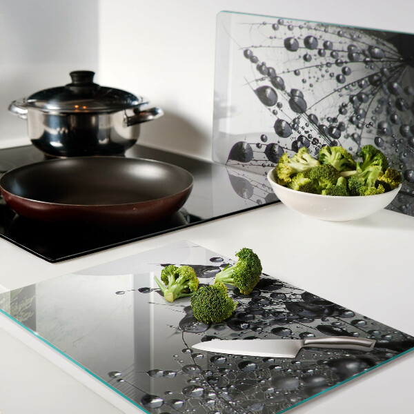 Planche à découper verre Gouttes d'eau sur les plantes