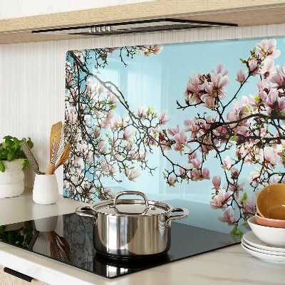 Planche à découper verre Fleurs de magnolia sur fond bleu