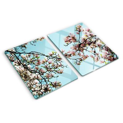 Planche à découper verre Fleurs de magnolia sur fond bleu