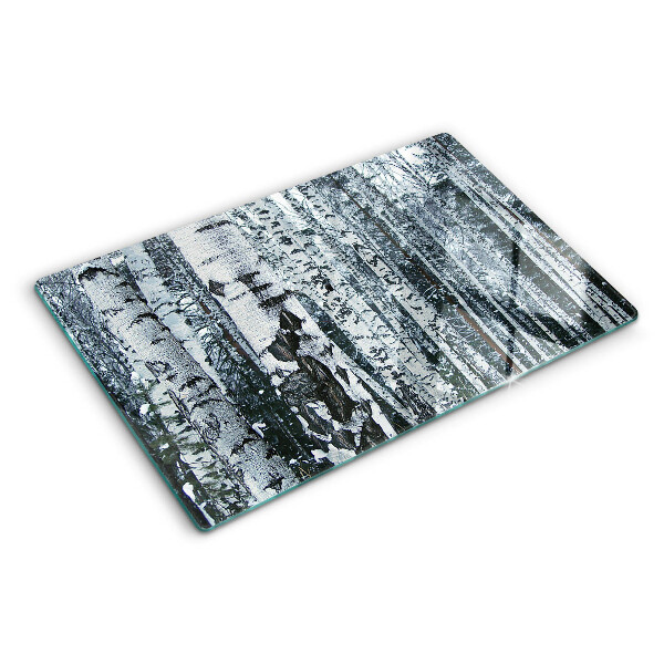 Planche à découper en verre Forêt de bouleaux dans un paysage hivernal