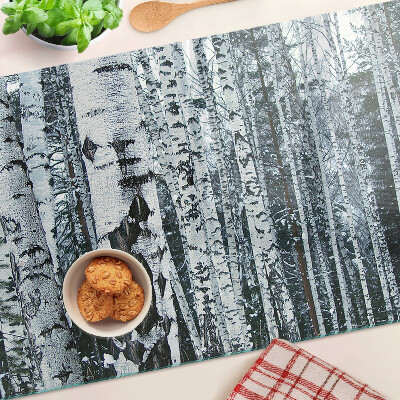 Planche à découper en verre Forêt de bouleaux dans un paysage hivernal
