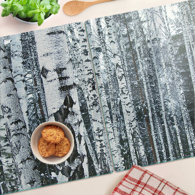 Planche à découper en verre Forêt de bouleaux dans un paysage hivernal