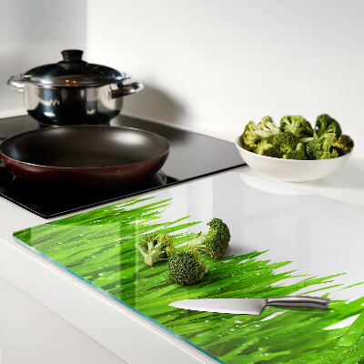 Planche à découper verre Herbe verte avec des gouttes d'eau