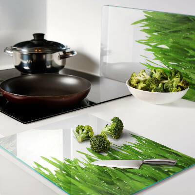 Planche à découper verre Herbe verte avec des gouttes d'eau