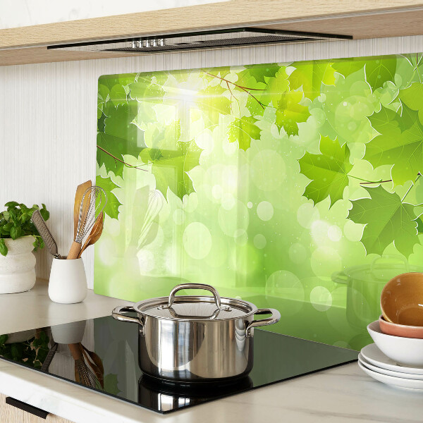 Planche à découper en verre Feuilles aux rayons du soleil