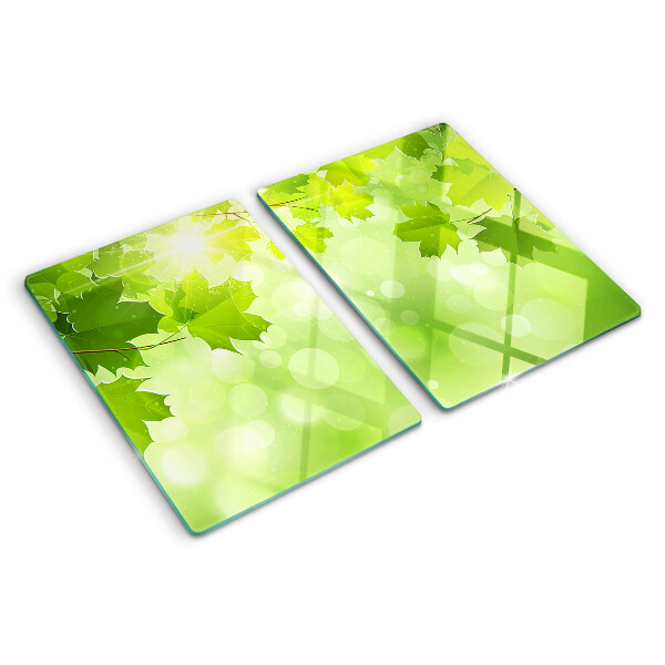 Planche à découper en verre Feuilles aux rayons du soleil
