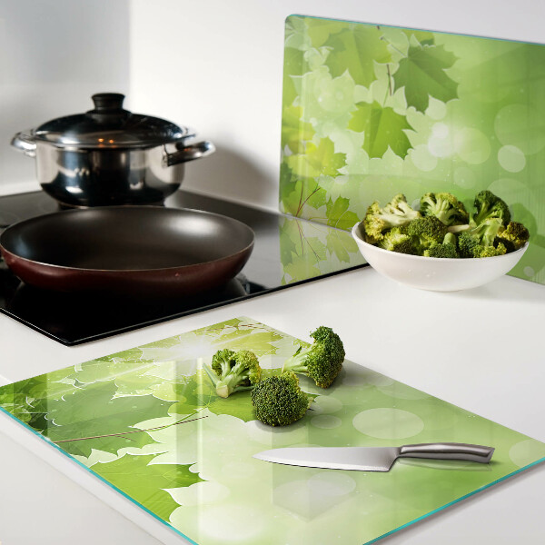 Planche à découper en verre Feuilles aux rayons du soleil