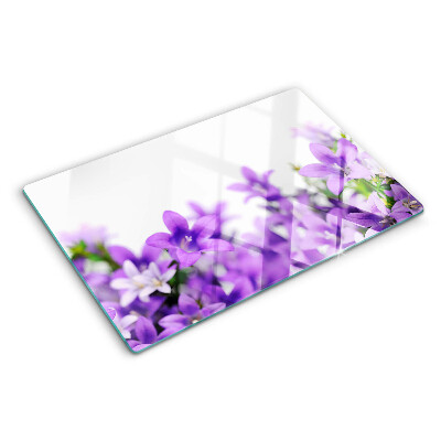 Planche à découper verre Fleurs violettes en arrière-plan