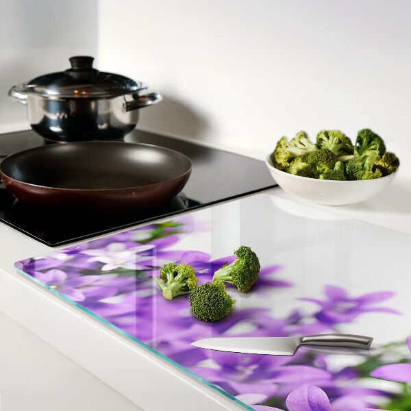 Planche à découper verre Fleurs violettes en arrière-plan