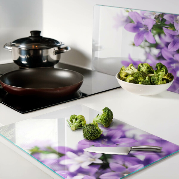 Planche à découper verre Fleurs violettes en arrière-plan