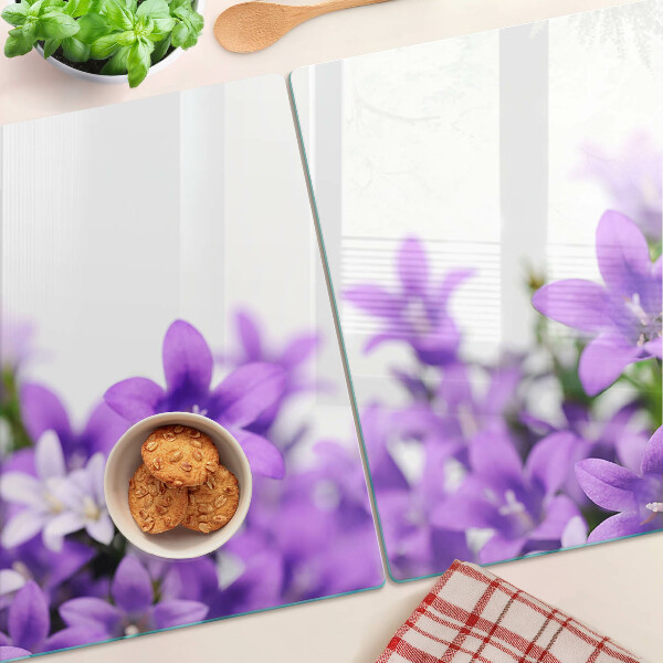 Planche à découper verre Fleurs violettes en arrière-plan