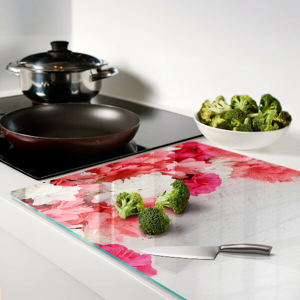 Planche à découper en verre Fleurs dans les tons de rose et de blanc