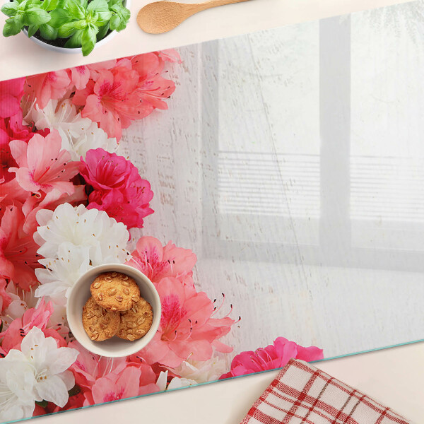 Planche à découper en verre Fleurs dans les tons de rose et de blanc