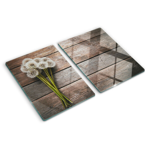 Planche à découper en verre Fleurs de pissenlit sur fond de bois