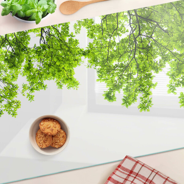 Planche à découper en verre Feuilles vertes contre le ciel