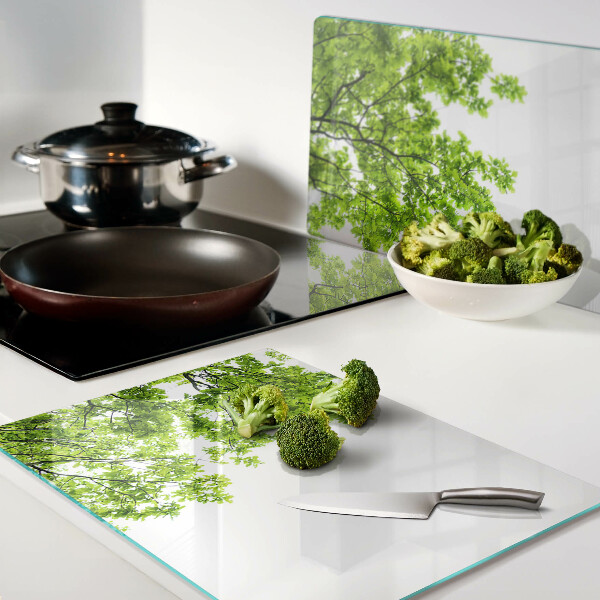 Planche à découper en verre Feuilles vertes contre le ciel