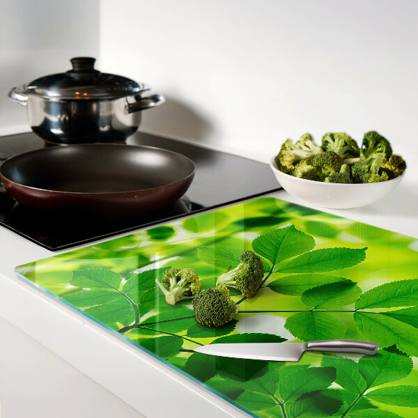 Planche à découper verre Feuilles sur fond vert