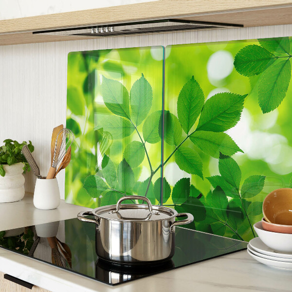 Planche à découper verre Feuilles sur fond vert