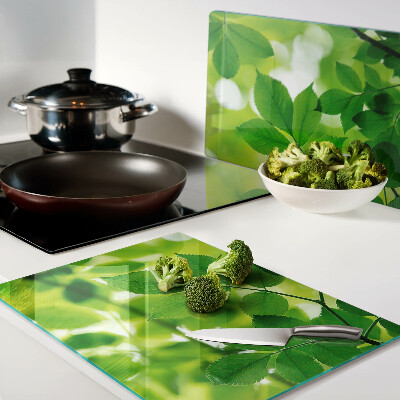 Planche à découper verre Feuilles sur fond vert