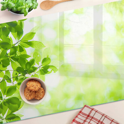 Planche à découper en verre Feuilles vertes à la lumière
