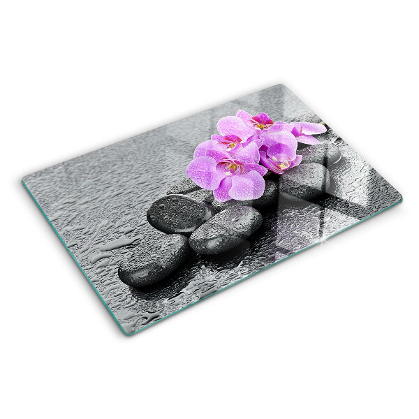 Planche à découper verre Fleurs et pierres sur fond d'eau