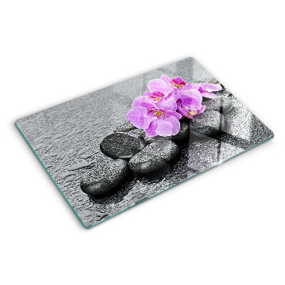 Planche à découper verre Fleurs et pierres sur fond d'eau