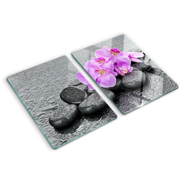 Planche à découper verre Fleurs et pierres sur fond d'eau