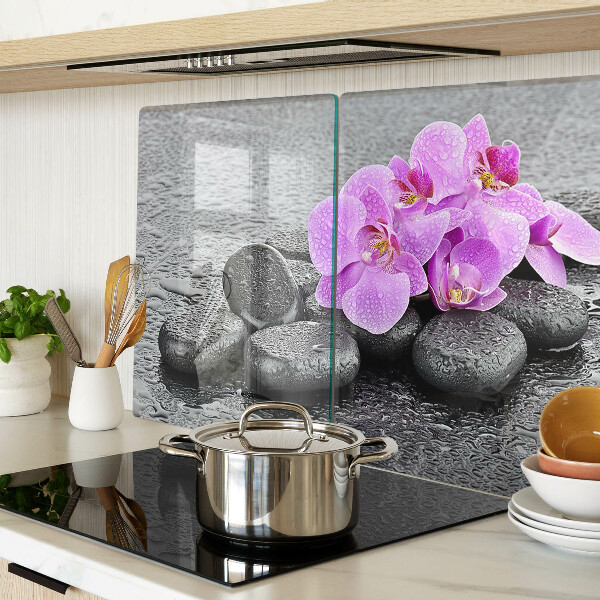 Planche à découper verre Fleurs et pierres sur fond d'eau